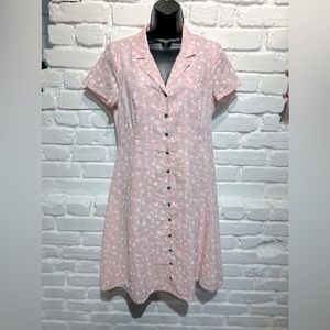 Mod cloth size 8 button-down pink dress with white white and green baby flowers.
